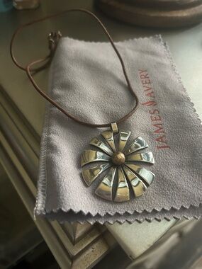 James Avery  retired Silver Floral Pendant with bronze  on leather James Avery’s